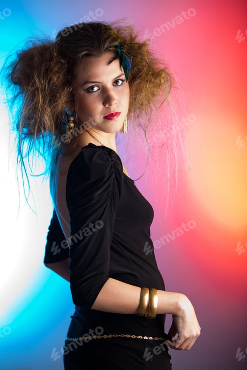 Preview: Beautiful Woman With A Messy Hairdo Over A Colorful Background