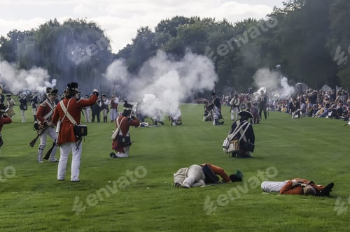 Preview: Wheaton, Illinois/Usa - September 13, 2014: Actors Stage A Mock Battle Between British And American