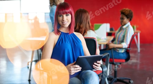 Preview: Confident Female Designer Working On A Digital Tablet In Red Creative Office Space