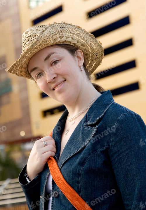 Preview: Beautiful Girl Outdoors Wearing A Panama Hat With A Friendly Face
