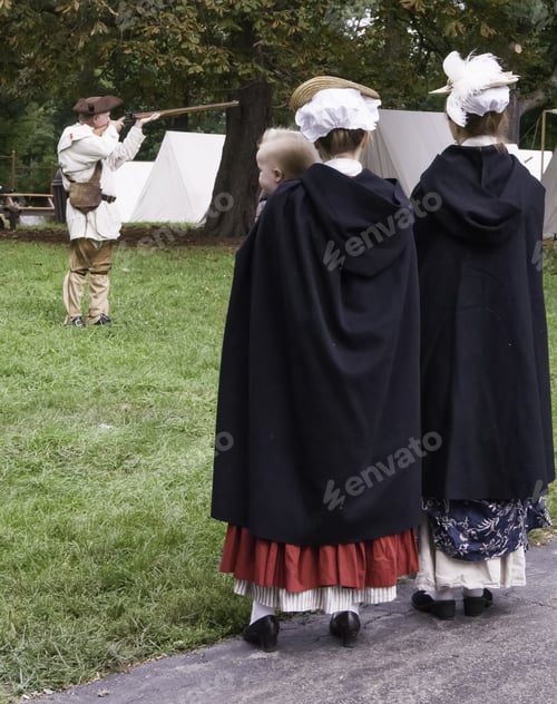 Preview: Wheaton, Illinois/Usa - September 13, 2014: Two Women Reenactors, One Holding A Baby, Watch A