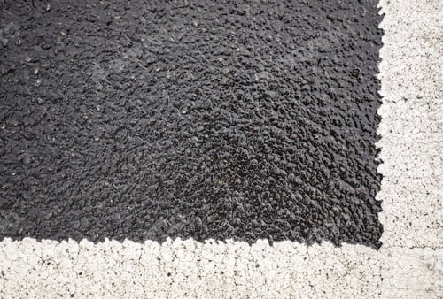 Preview: White Parking Lines On A Wet Road