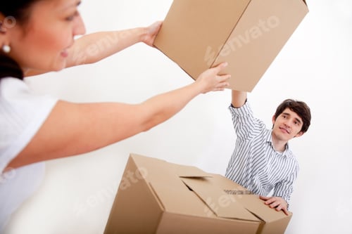 Preview: Couple With Cardboard Boxes Moving To A New House