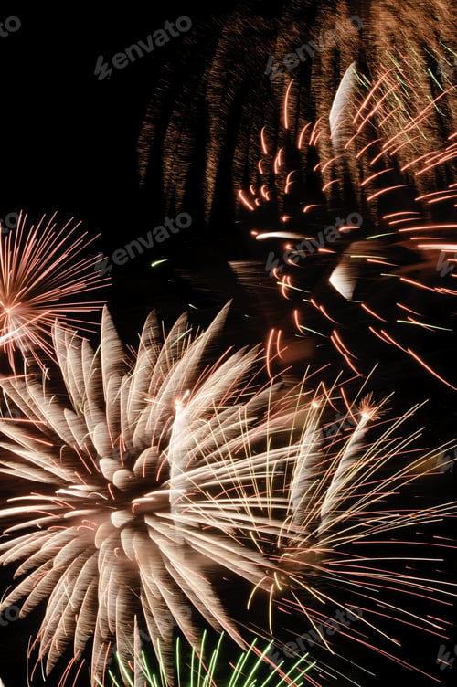Preview: Multiple Bursts Of Fireworks, One With Feathery White Motion Blur