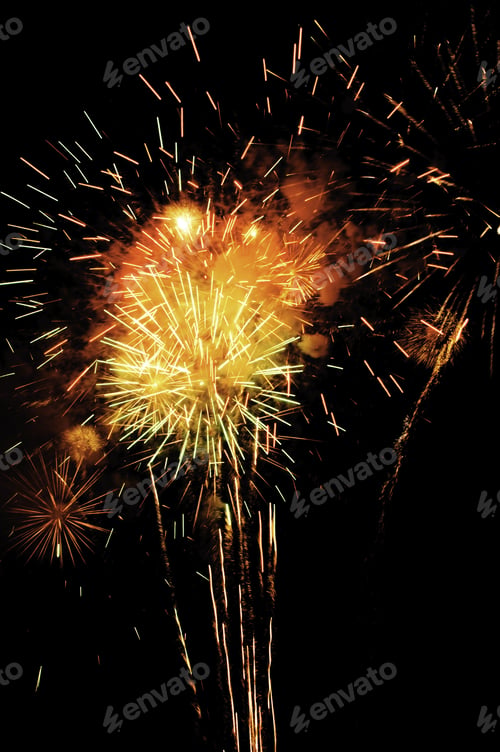 Preview: Start Of Fireworks Finale With Multiple Rocket Trails And Yellow And Reddish-Orange Smoke