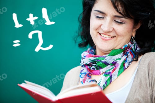 Preview: Female Math Student Holding A Book And Smiling