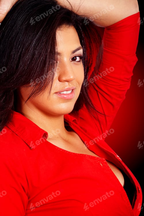 Preview: Fashion Woman Portrait In Red Smiling Over A Dark Background