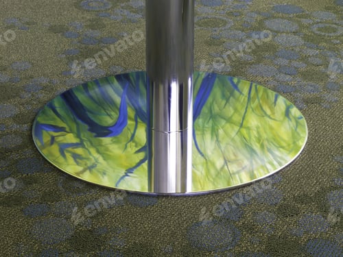 Preview: Reflection In Student Lounge: Shiny Round Base Of Table Reflecting Detail Of Nearby Wall