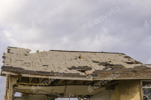 Preview: Remains Of Roof On Garage Attached To House Hit By A Tornado