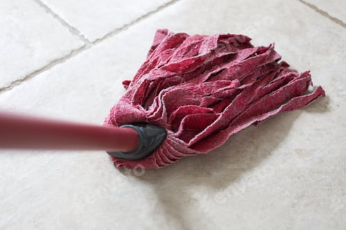 Preview: Red Kitchen Mop Being Used To Clean A Floor Surface