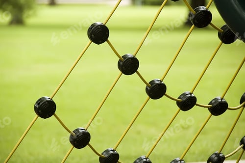 Preview: Detail Of Climbing Net On Playground Equipment After Rain