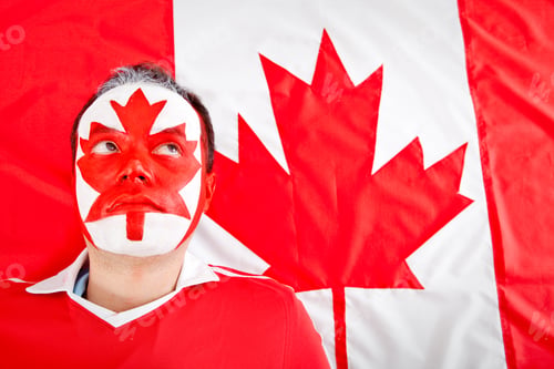 Preview: Patriotic Canadian Man With The Flag Painted On His Face