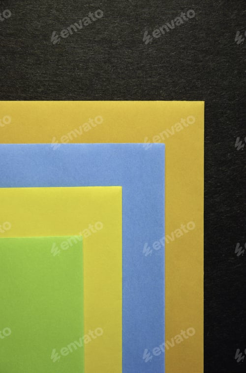 Preview: Four Colored Envelopes On Black Cardboard
