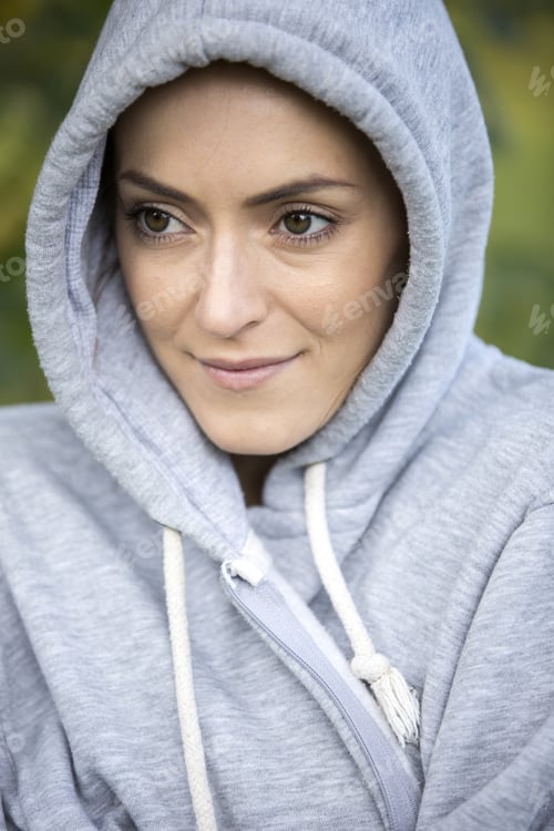 Preview: Young Woman On A Cold Morning In A Hooded Top Before Going Out For A Run