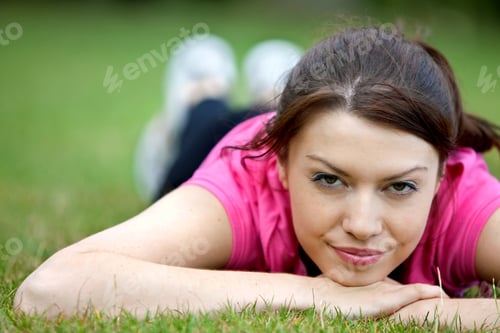 Preview: Athletic Woman Lying On The Floor Outdoors