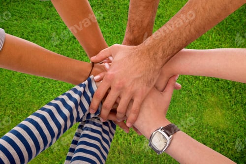 Preview: Group Of People With Their Hands Together In The Middle