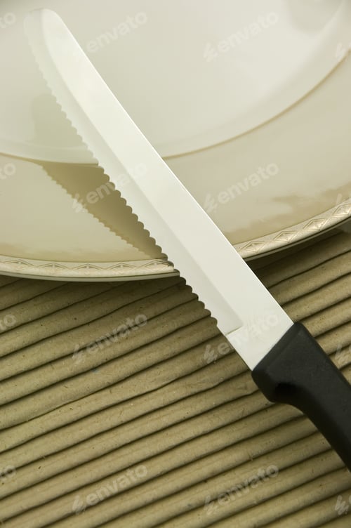 Preview: Steak Knife And Dinner Plate On Corrugated Cardboard
