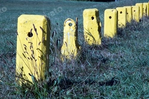 Preview: Parking Posts Without A Chain In An Open Field