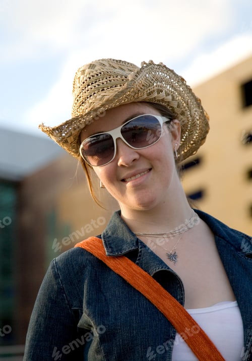 Preview: Portrait Of A Woman Wearing A Hat And Sunglasses Outdoors