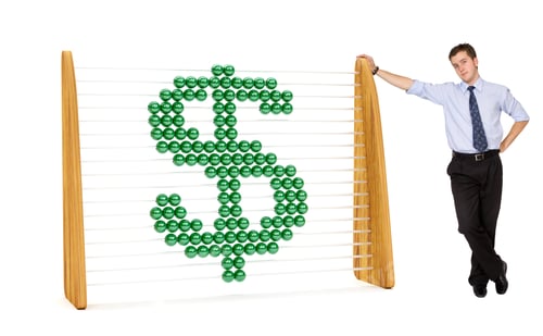 Preview: Business Man With A Dollar Symbol In An Abacus Isolated