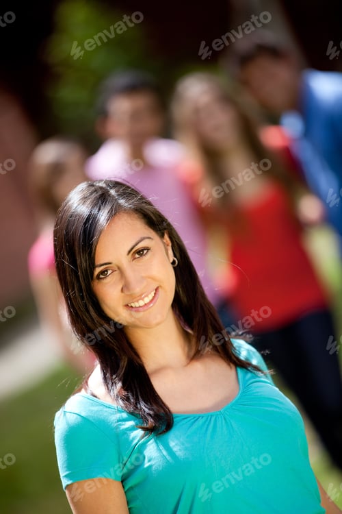 Preview: Portrait Of A Casual Woman Smiling Outdoors