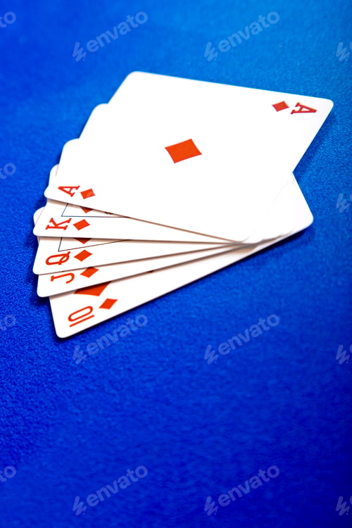 Preview: Poker Cards On A Blue Felt Showing A Royal Flush