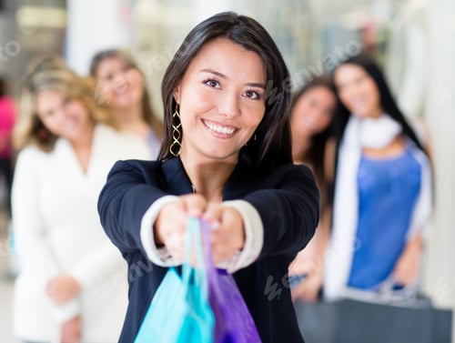Preview: Happy Woman Shopping With Her Friends And Holding Bags