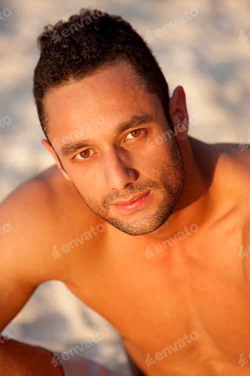 Preview: Male Model Portrait At The Beach Looking Serious