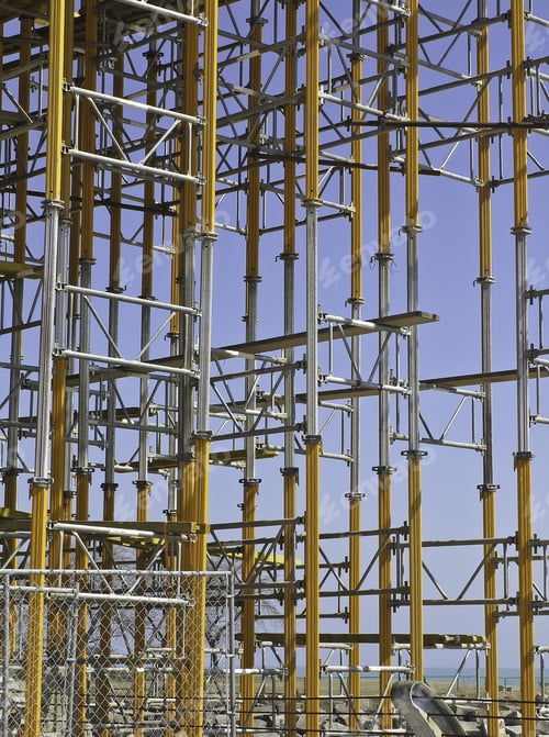 Preview: Steel Framework Of Large Building Under Construction, With Blue Sky For Background
