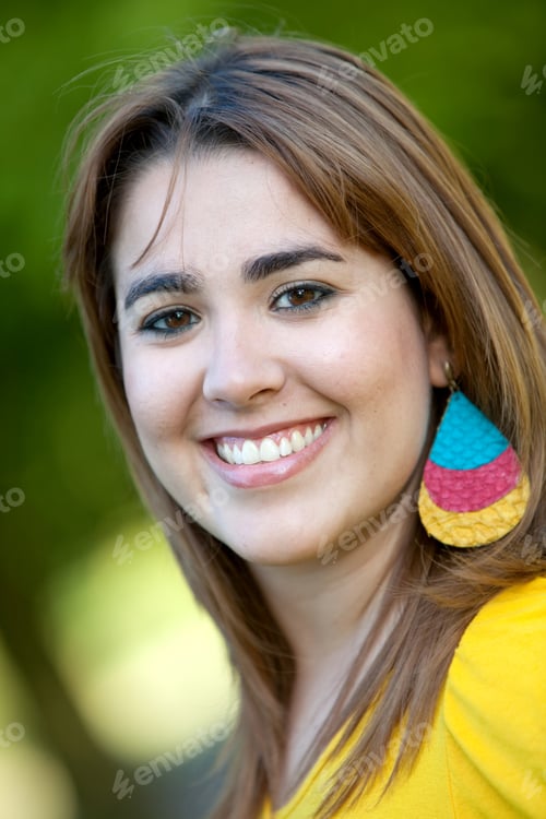 Preview: Portrait Of A Beautiful Female Smiling Outdoors