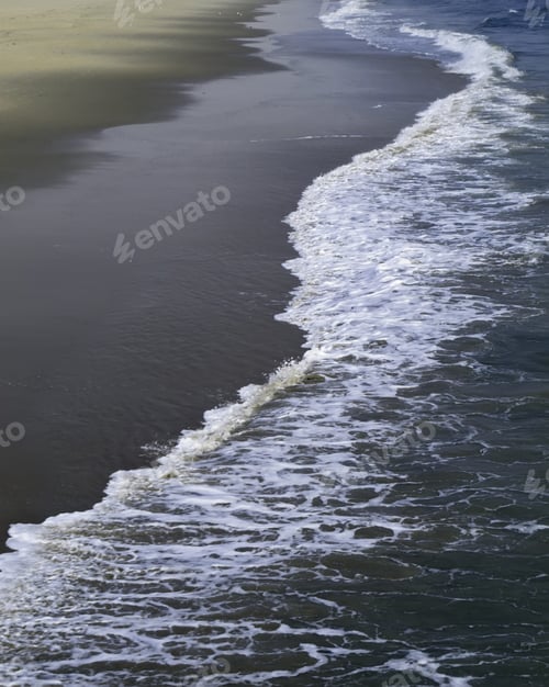 Preview: Waves Of Atlantic Ocean Breaking Toward Sandy Beach In Daylight
