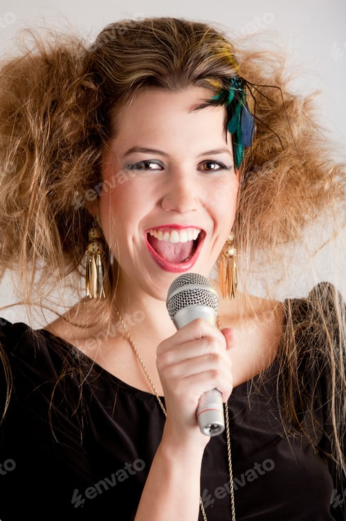 Preview: Rocker Woman With Messy Hairdo Singing With A Microphone