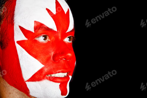 Preview: Canadian Man With The Flag Painted On His Face ? Isolated Over Black