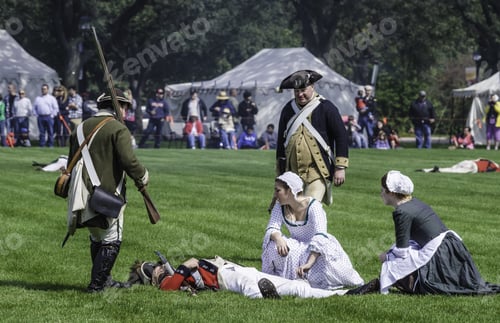 Preview: Wheaton, Illinois/Usa - September 12, 2015: An Actor Plays Dead, Portraying A British Casualty