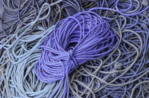 Preview: Several Ropes For Lobster Fishing Piled Together On A Dock In Maine
