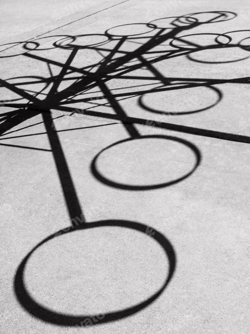 Preview: Shadows Of Iron Rings On Concrete, In Black And White