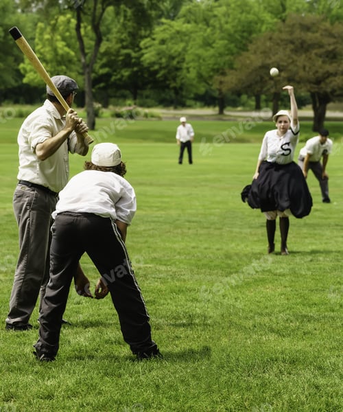 Preview: Wheaton, Illinois, Usa - July 25, 2015: Batter And Catcher Watch A Baseball Hurled By A Young Woman