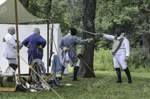 Preview: Wheaton, Illinois/Usa - September 12, 2015: Two Male Actors Rehearse A Sword Fight In A Military