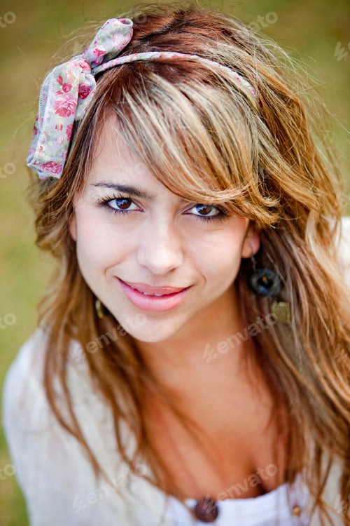Preview: Portrait Of A Beautiful Woman Smiling Outdoors