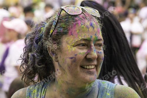 Preview: Lake Zurich, Illinois, Usa - June 20, 2015: A Woman Celebrant With Colored Powder In Her Hair And