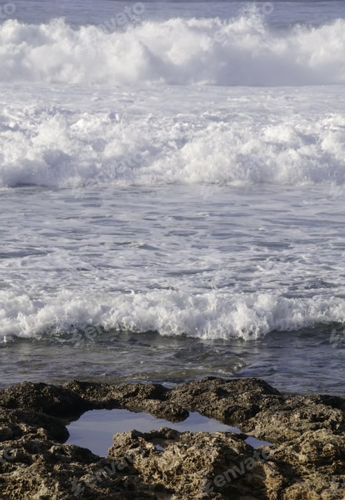 Preview: Waves Rushing Toward Tide Pool On Volcanic Rock