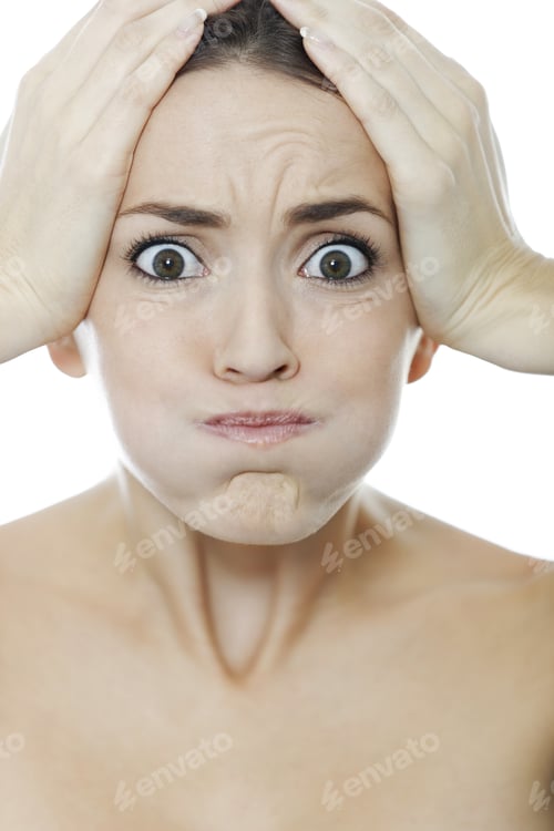 Preview: Young Woman Holding Her Head Looking Worried Or Annoyed