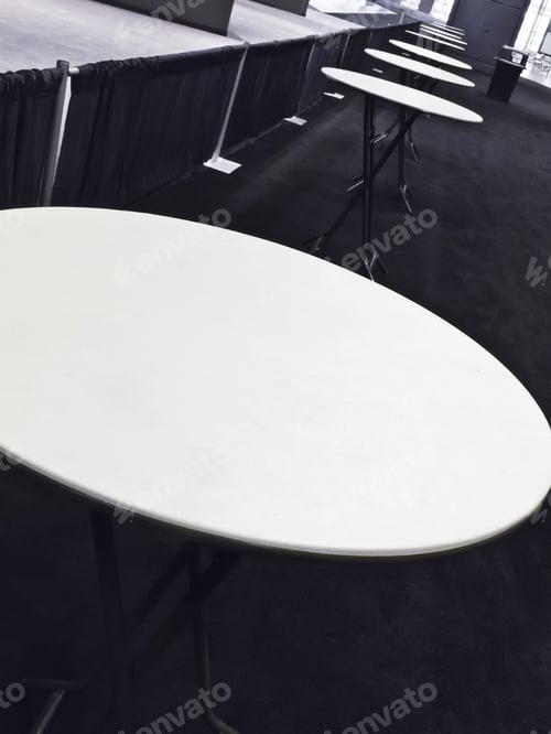 Preview: Row Of Round Tables For Eating Fast Food At Convention Center