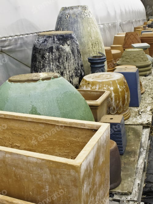 Preview: Variety Of Flower Boxes And Flowerpots In Storage Outside Greenhouse Early In Spring