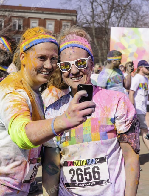 Preview: Kalamazoo, Michigan, Usa - April 12, 2014: Two Smiling Women Runners Take A Selfie After A 5K "Fun
