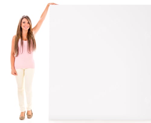 Preview: Casual Woman Displaying Something On A Banner - Isolated Over White