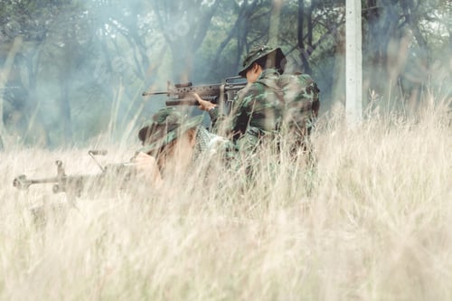 Preview: Soldier Hiding In Bushes Ready To Shoot. Ambush His Ememy, Ready His Assault Rifle. Hiding Below