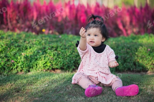 Preview: Portrait Of Cute Baby Travel At Flowers Garden