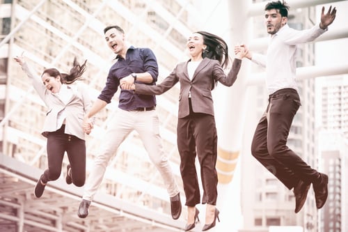 Preview: Young Business Team Jumping For Huge Celebration Of Successful Team Work. Taken Outdoor In