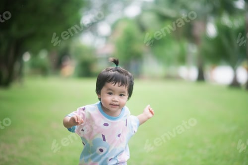 Preview: Cute Baby Running In The Garden